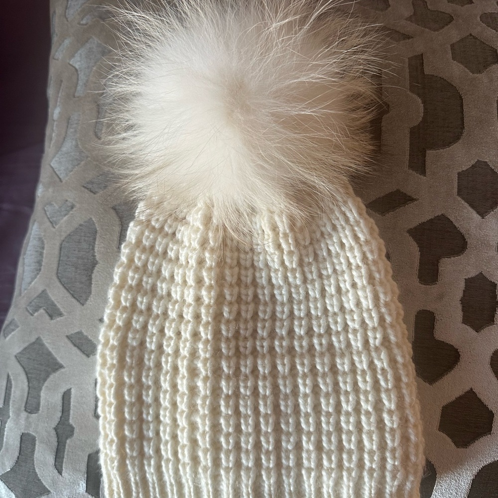 Beige knitted winter beanie with real fur Pom Pom